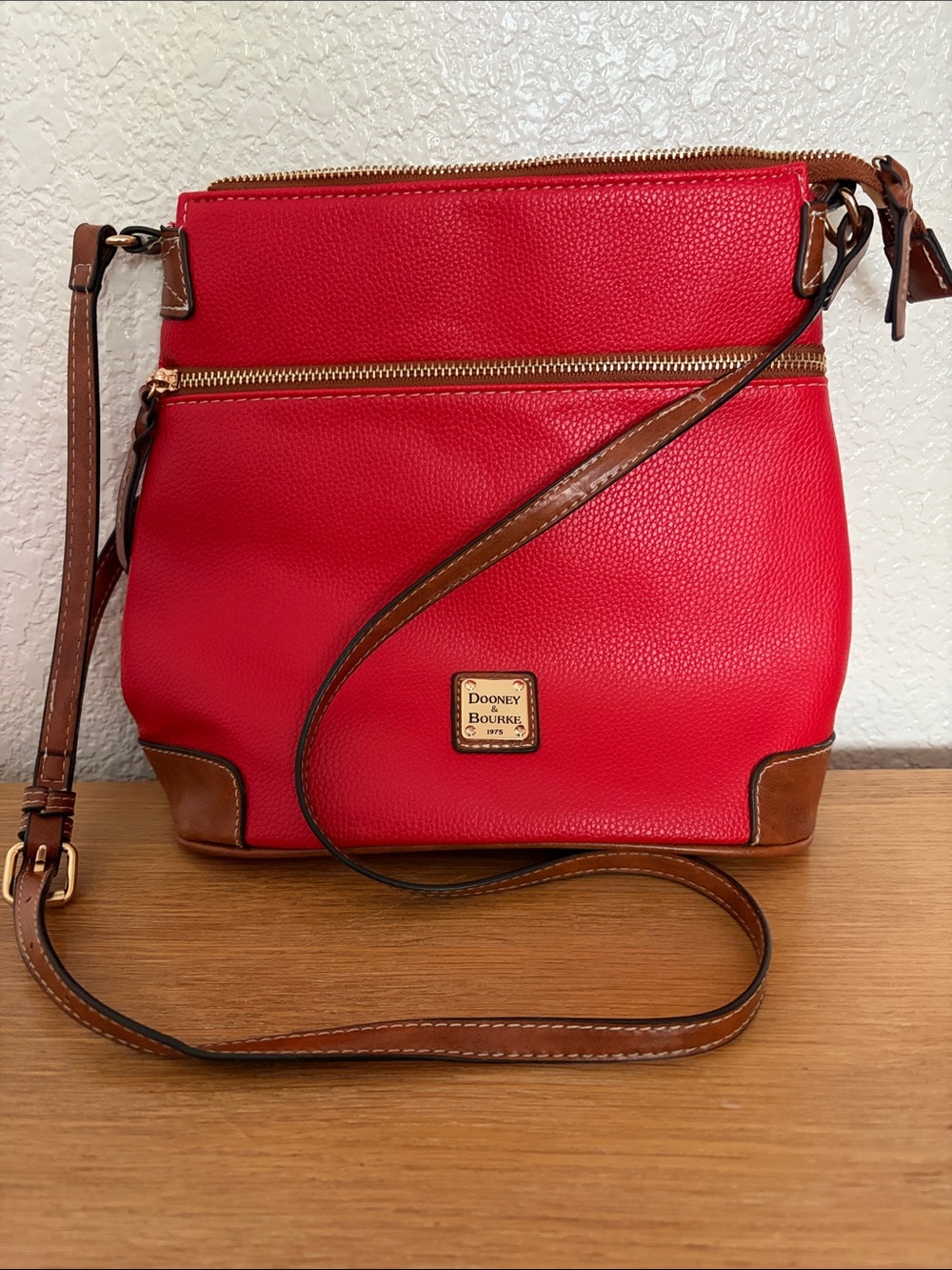 Dooney & Bourke Red Pebbled Leather Crossbody with Brown Trim